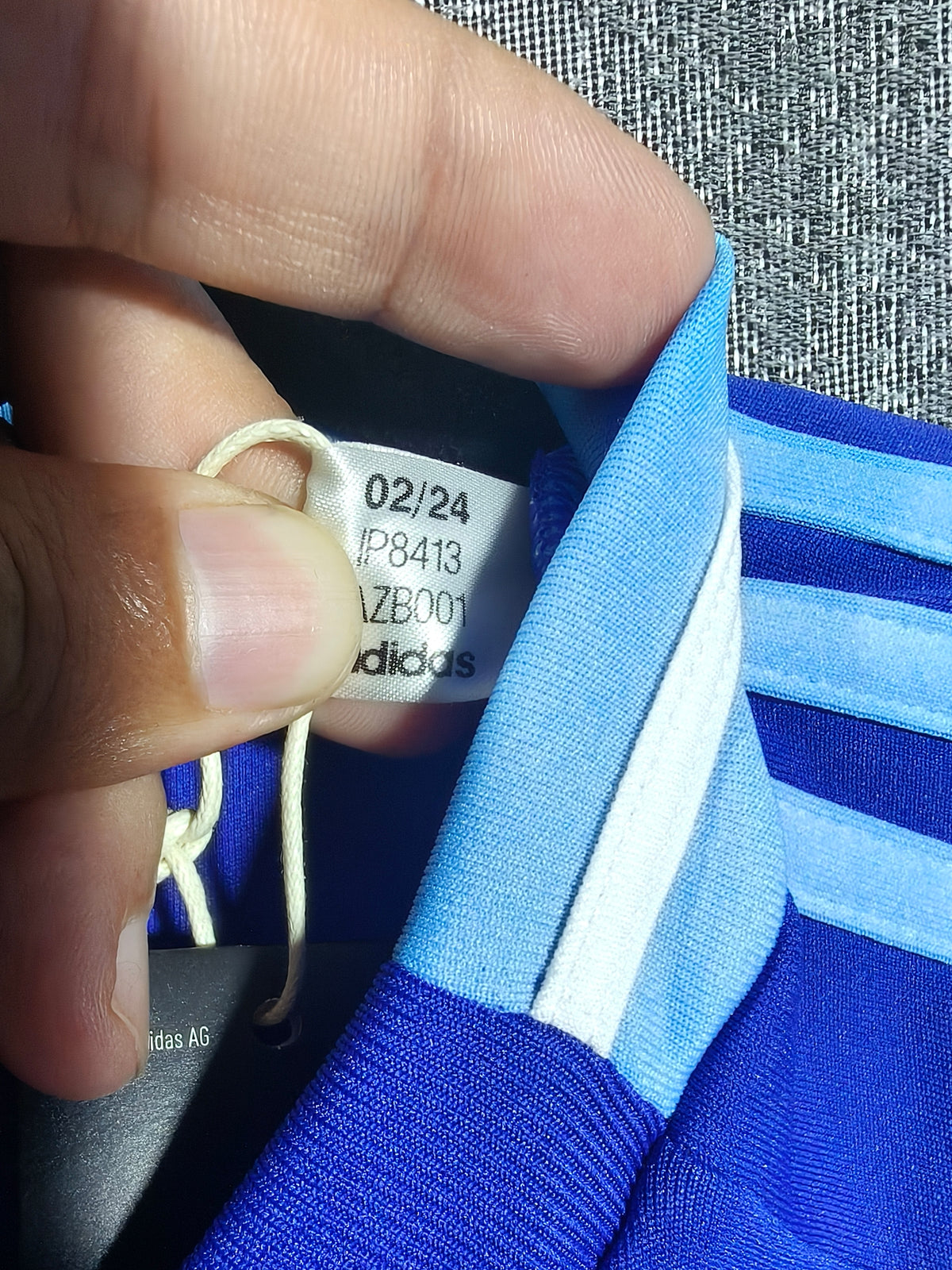 Jersey Argentina 2024 – etiqueta con código IP8413