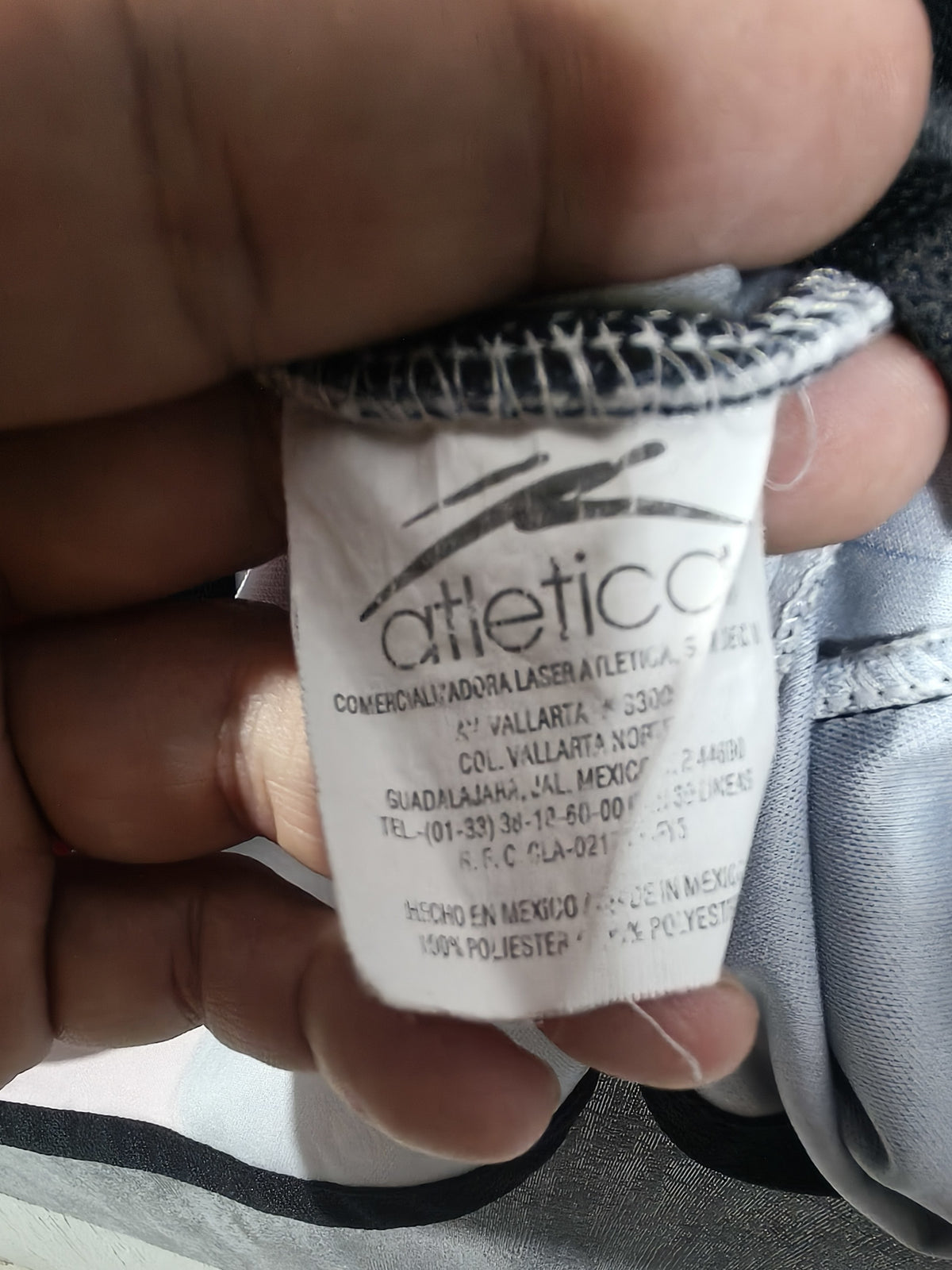 Jersey Atlas 2007 – etiqueta de composición 100% poliéster